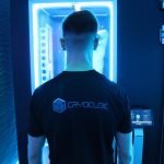 Man facing the CryoCube with his back to the camera